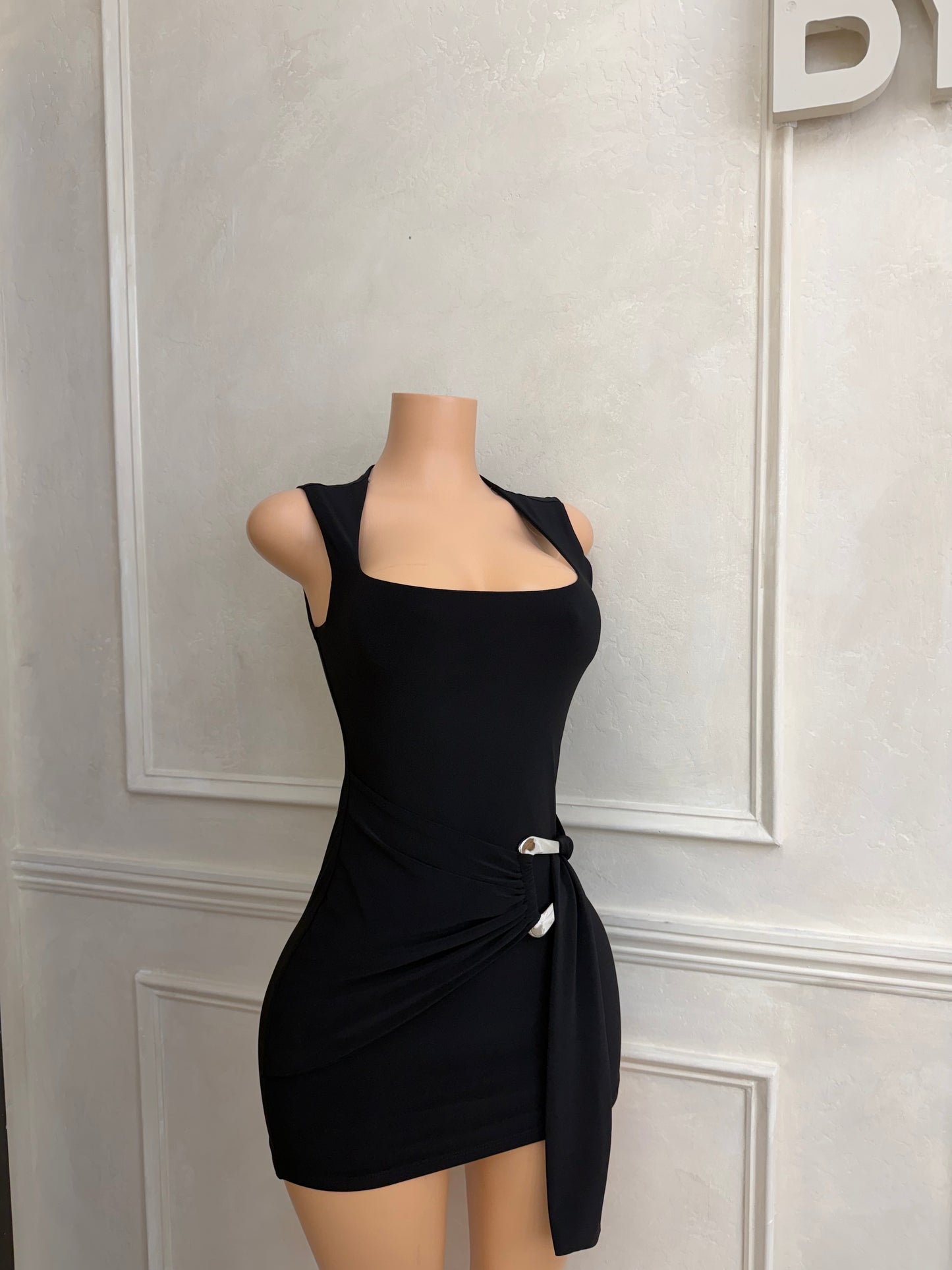 Black sleeveless drape trim dress