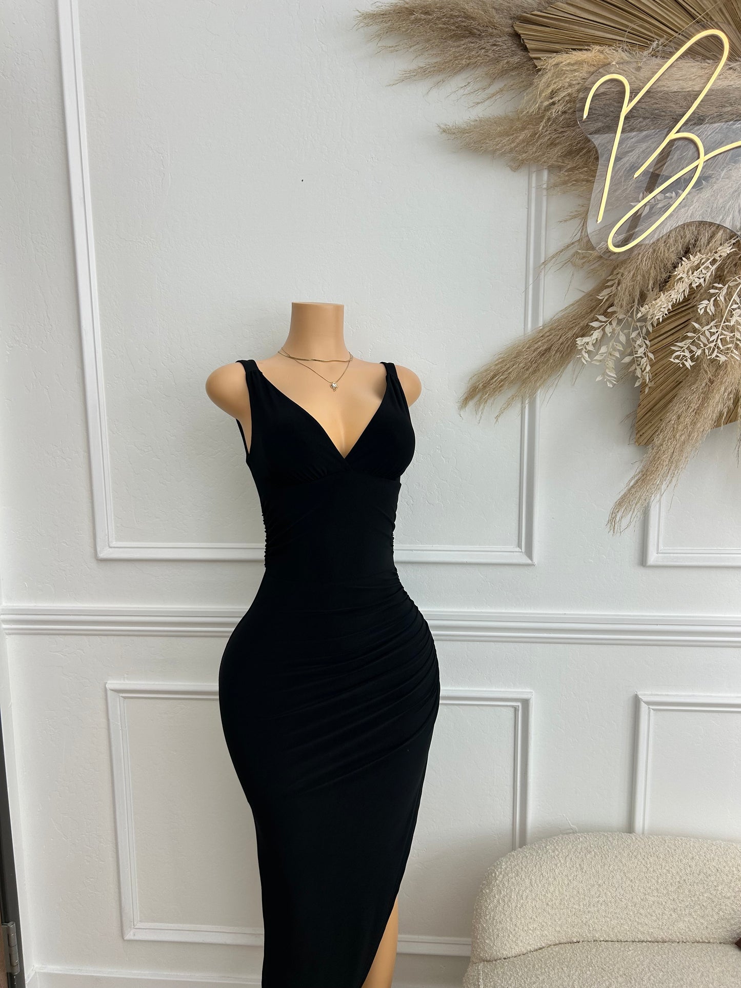 Black sleeveless asymmetrical maxi dress