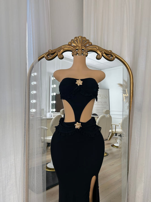 Black maxi dress with slit and gold flower detailing